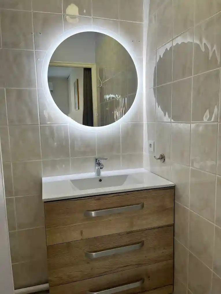 Rénovation salle de bain avec douche et meuble vasque